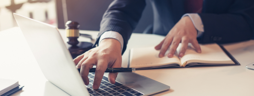 lawyer-using-laptop-for-remote-trial